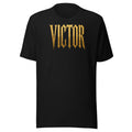 Victor black tee front view — gold gothic blackletter type on black cotton, Victor Scandal streetwear